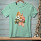 Mint t-shirt with mermaid artwork holding a martini, text "AIM HIGH" on a shell.