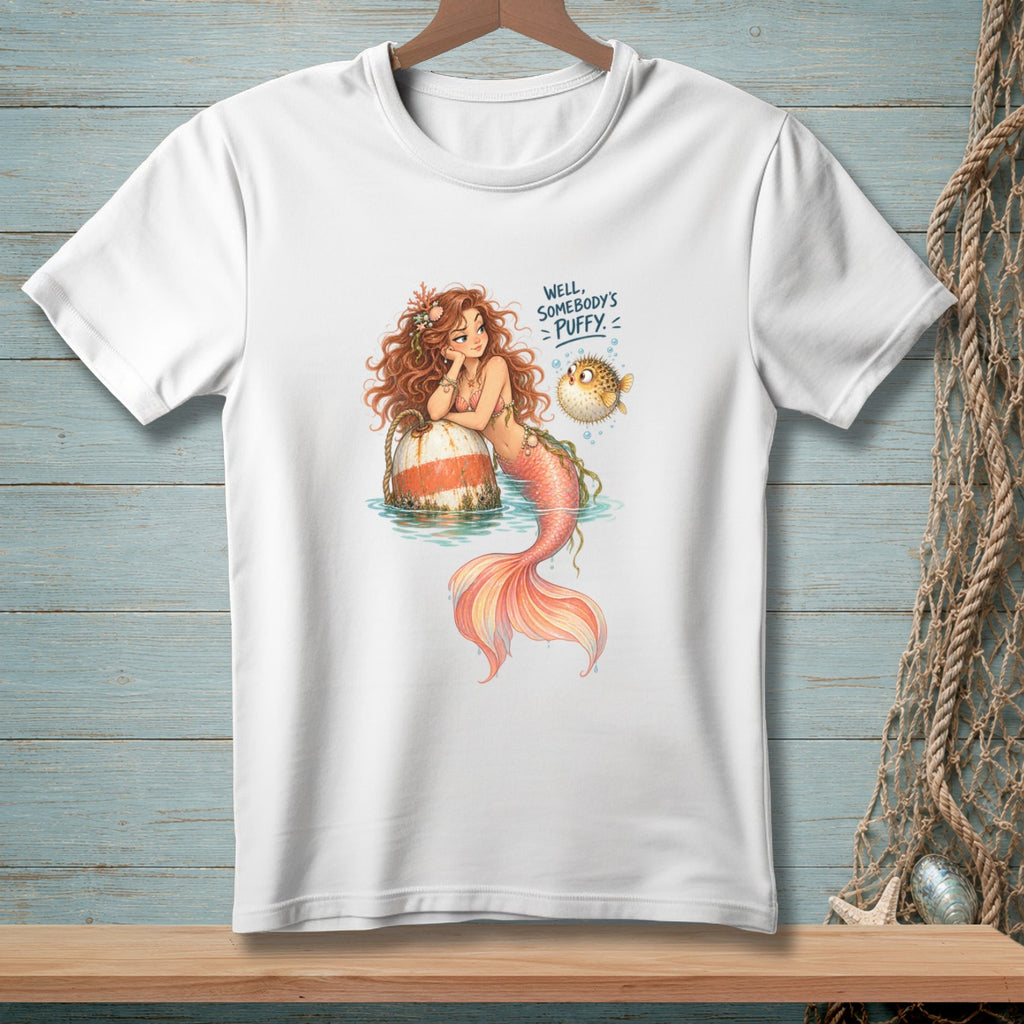 White t-shirt with mermaid and pufferfish graphic, saying "Well, somebody's puffy."