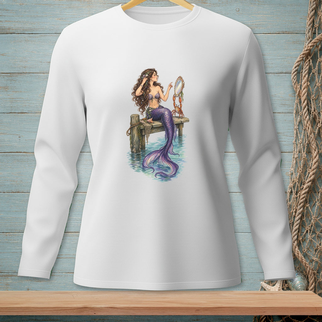 Long-sleeve white t-shirt with mermaid artwork holding a mirror on a wooden pier.