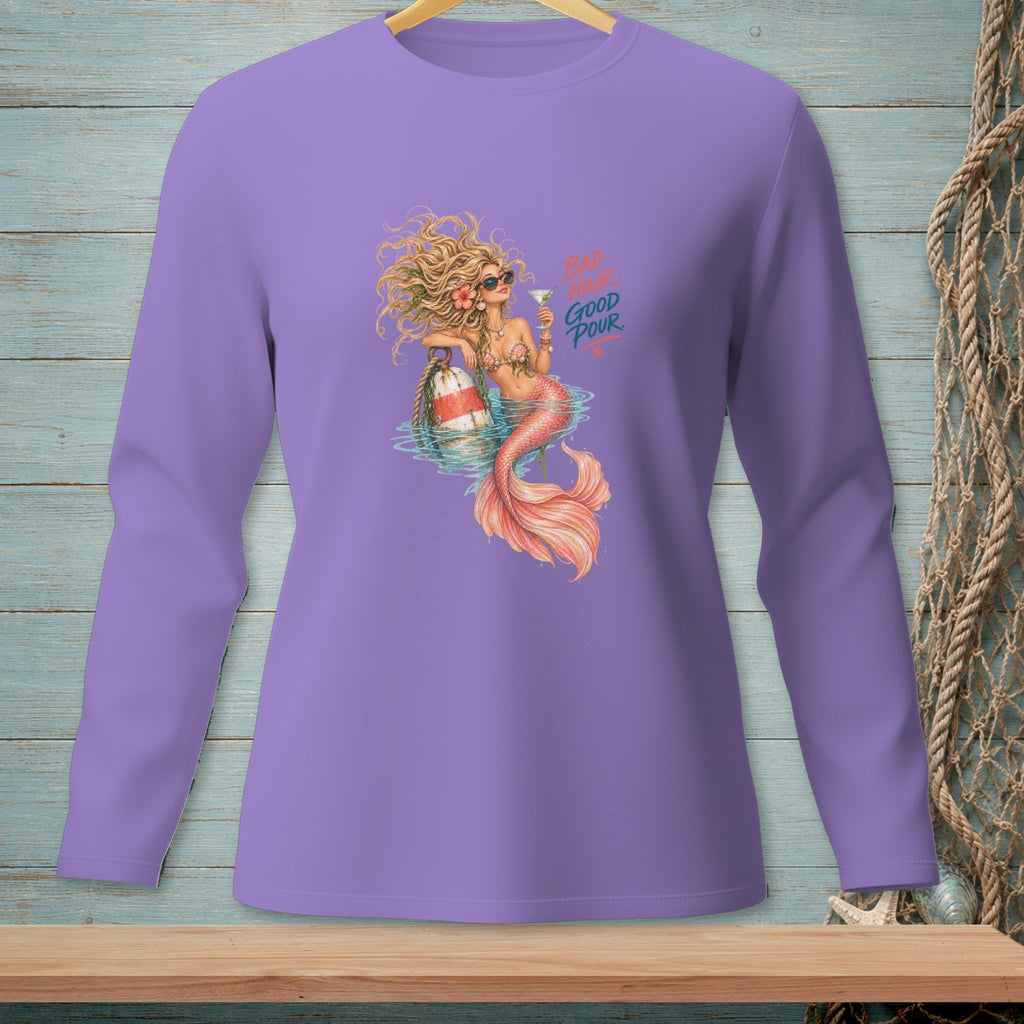 Mermaid with cocktail and buoy, text "BAD HAIR GOOD POUR" on purple shirt.