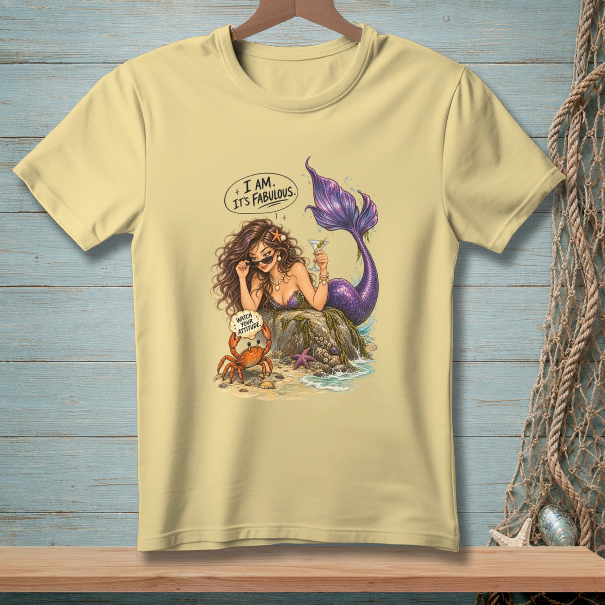 A mermaid with a purple tail holds a drink, a crab says "Watch Your Attitude".