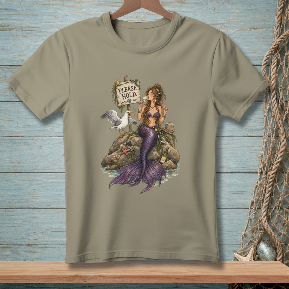 Mermaid with purple tail drinks wine next to seagull and sign reading "PLEASE HOLD."
