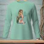 Mint green long-sleeve shirt with a mermaid and fish graphic and text "SEA SALT. ZERO REGRETS."