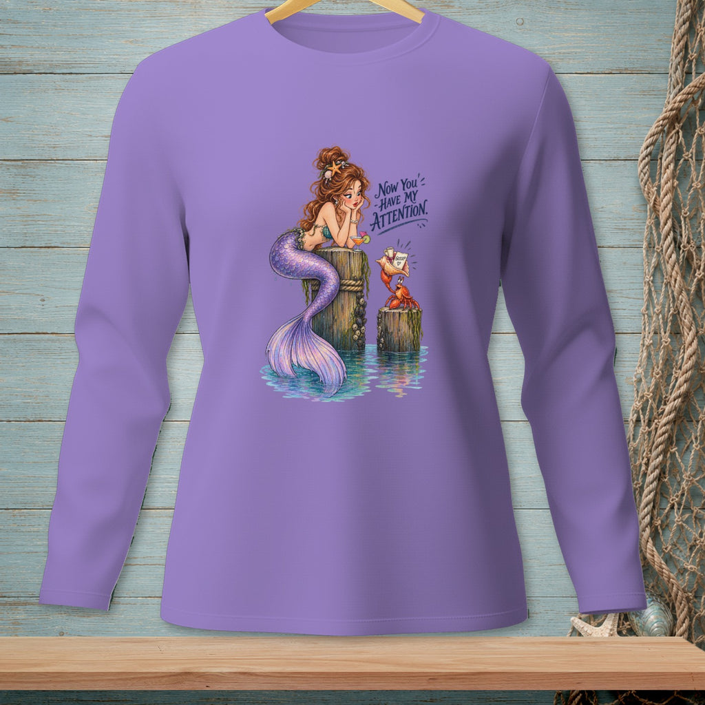 Mermaid sitting on a post with crab, reads "Now You've Have My Attention."