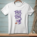 White t-shirt with "Talk to the Tail" text, mermaid tail, and crab graphic.