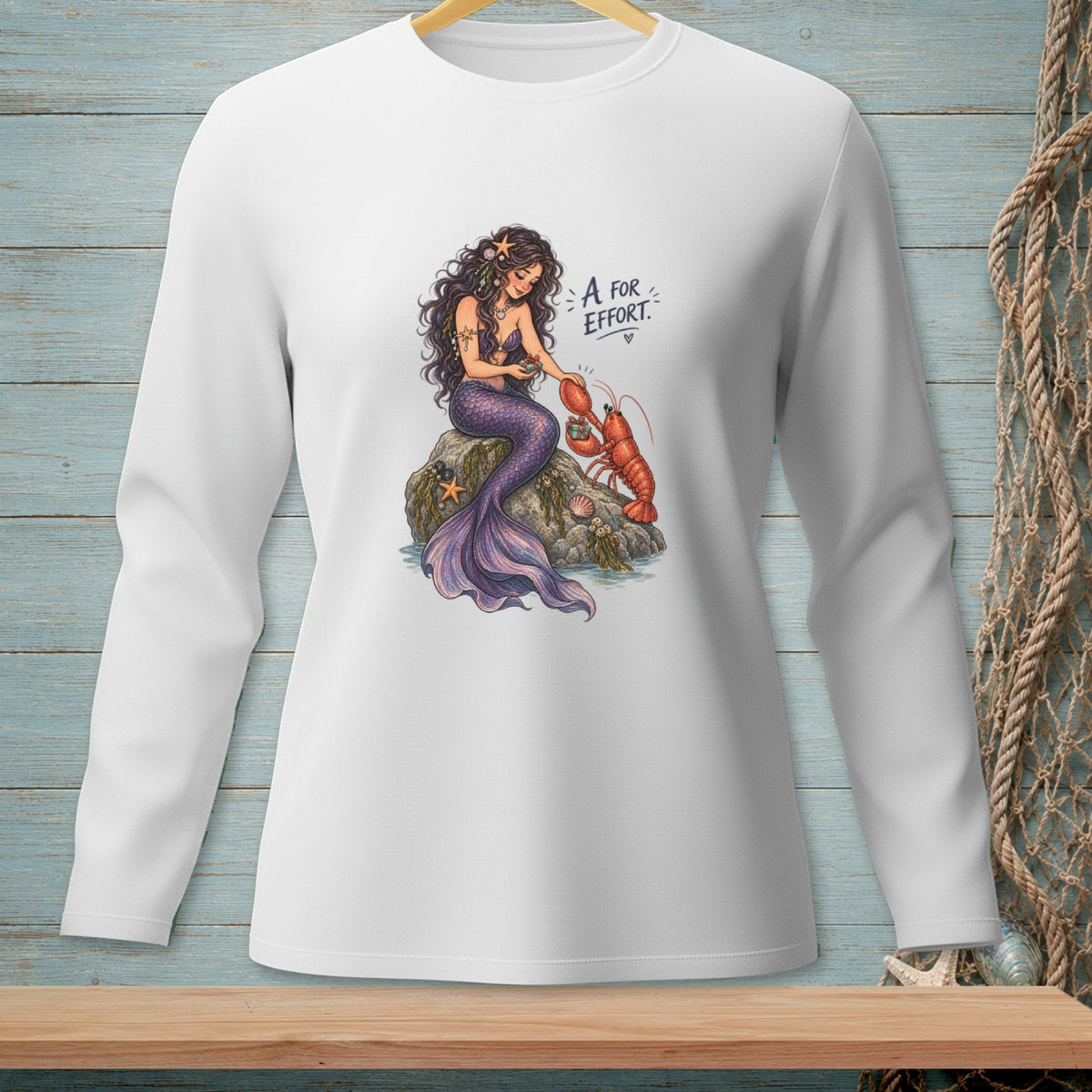 Mermaid giving a lobster a gift with text "A for EFFORT".