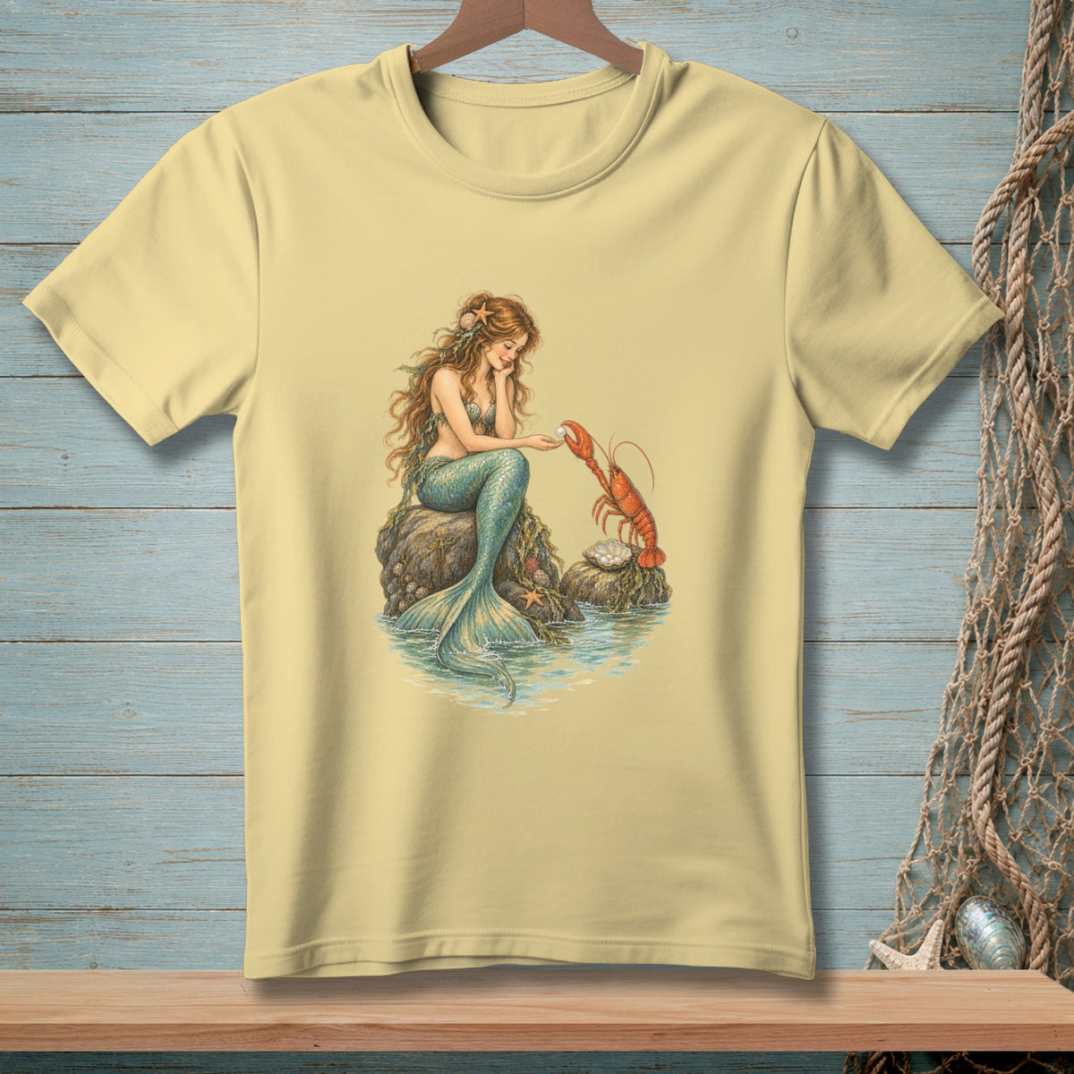 Mermaid with lobster and pearl on rock by the water.