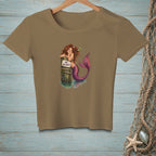 Mermaid resting on a post with a "No Vacancy" sign, in water.