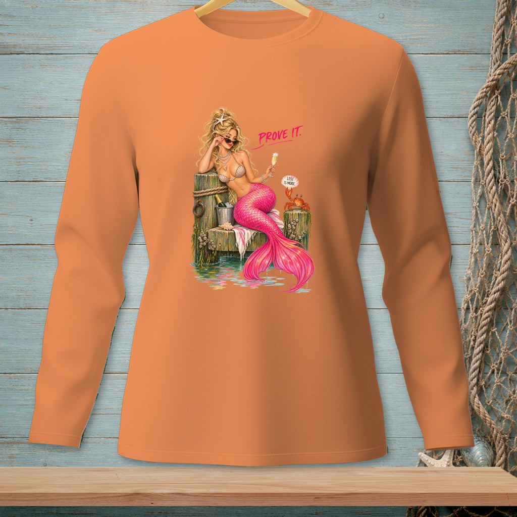 Orange long-sleeve shirt with a graphic of a mermaid holding champagne and the text "PROVE IT."