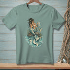 Mermaid with map and fish on rock in water, on a teal t-shirt.