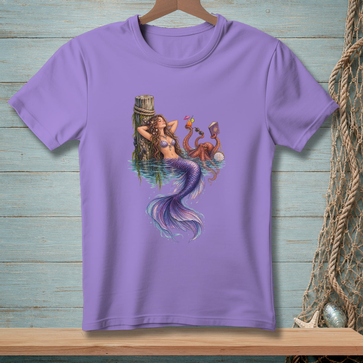 Mermaid relaxing by a pier with an octopus holding drinks and a book.