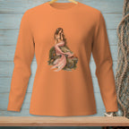 Orange long-sleeve shirt featuring a detailed illustration of a mermaid on a rock.