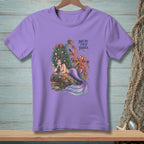 Lavender t-shirt with mermaid, octopus, and text "Not My First Jangle".
