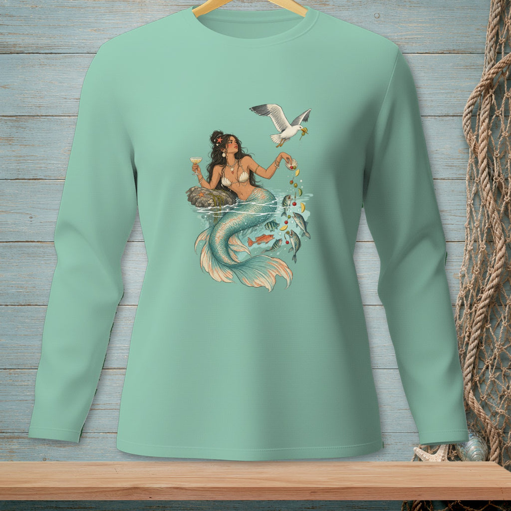 Mint long-sleeve t-shirt with a graphic of a mermaid holding a drink and a seagull overhead.