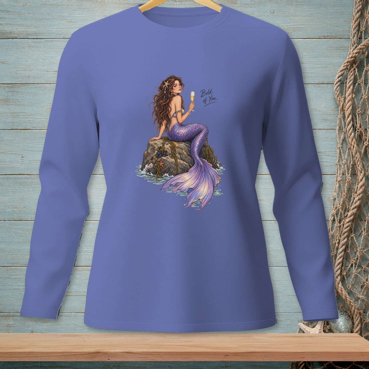 Purple long-sleeve shirt with a mermaid design and the text "Bold of You."