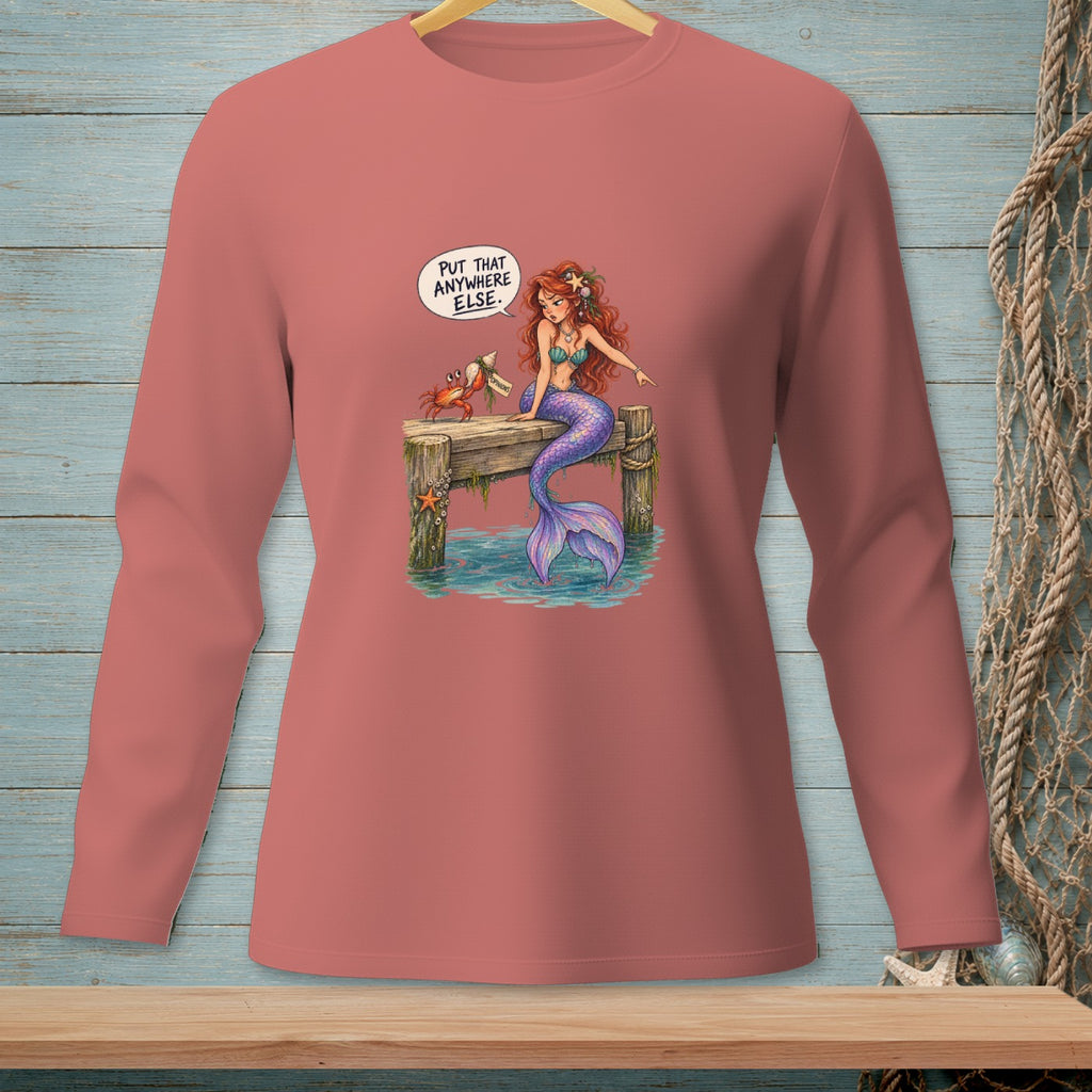 Mermaid on dock with crab, speaking "PUT THAT ANYWHERE ELSE".