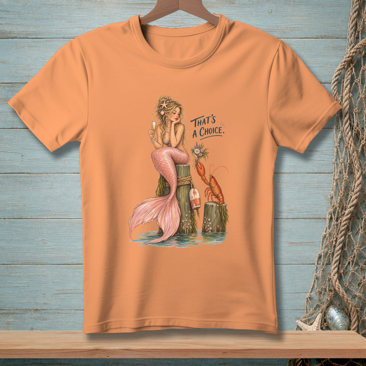 Mermaid with lobster and text "That's A Choice." on an orange t-shirt.