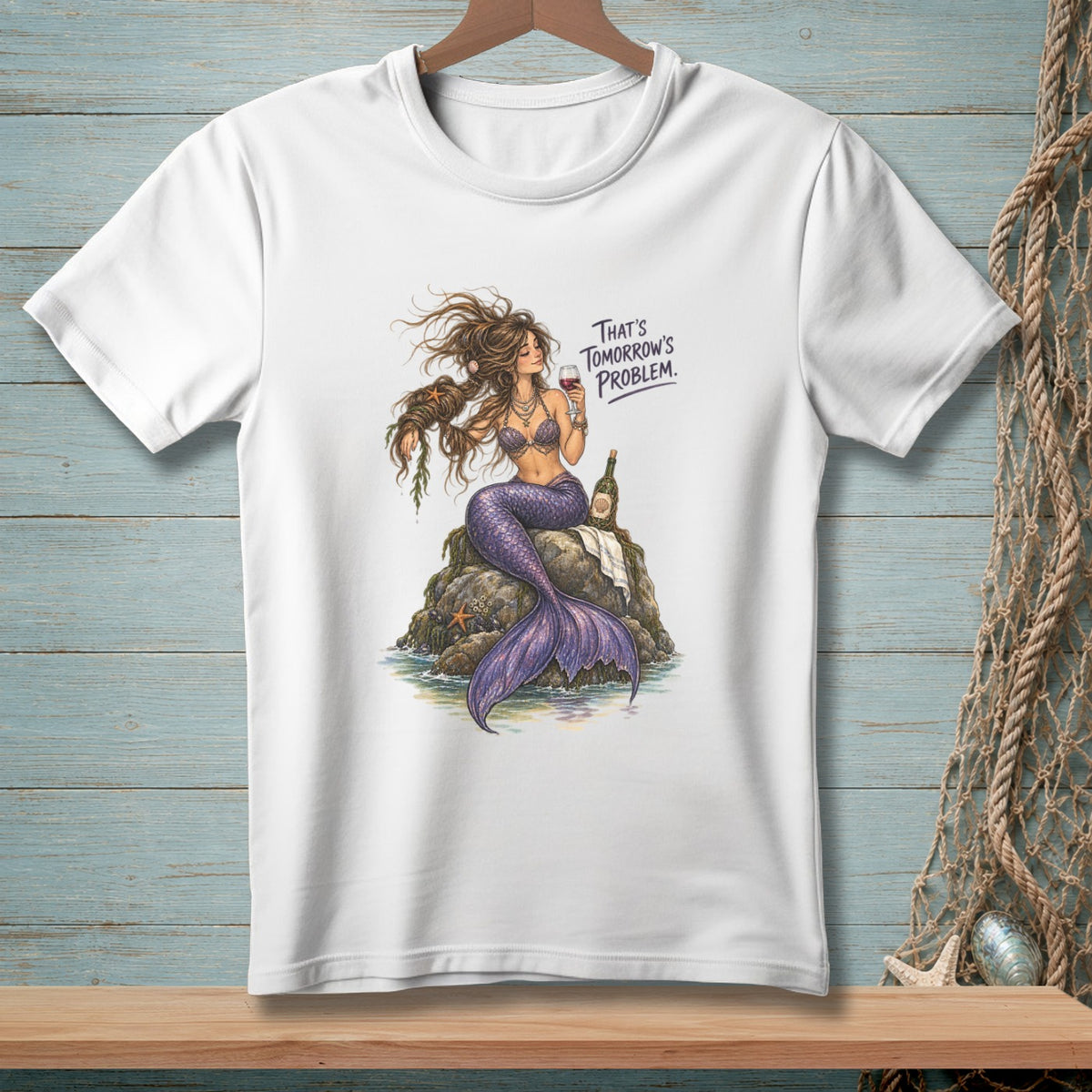 White t-shirt with illustration of a mermaid and the text "That's Tomorrow's Problem."