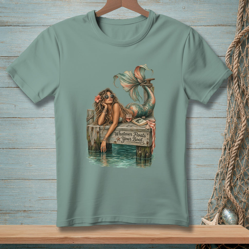 Mermaid on dock with text "Whatever Floats Your Boat."