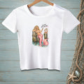 White t-shirt with a mermaid and crab graphic saying "And yet, here you are."