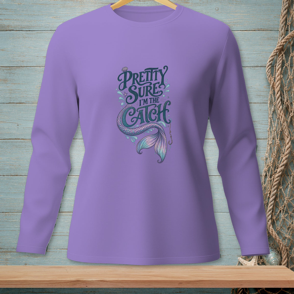 Purple long-sleeve shirt with "Pretty Sure I'm the Catch" mermaid tail design.
