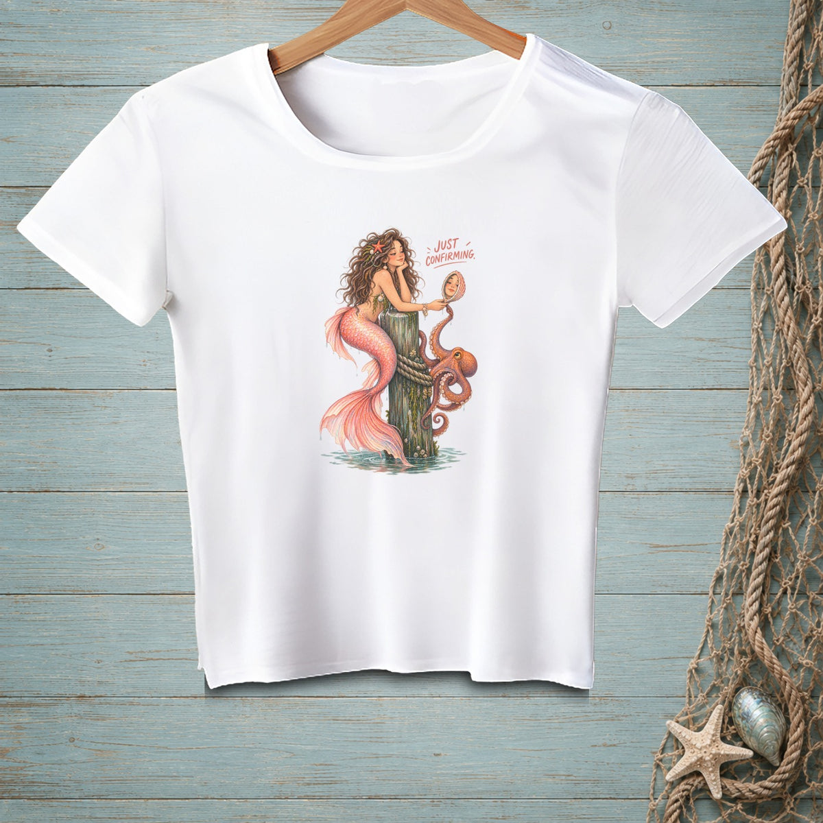 White t-shirt with a mermaid, octopus, and mirror graphic reading "Just Confirming".