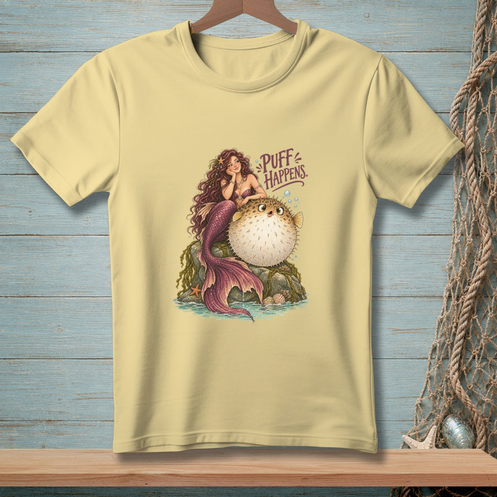Mermaid with pufferfish on a rock, text "PUFF HAPPENS."