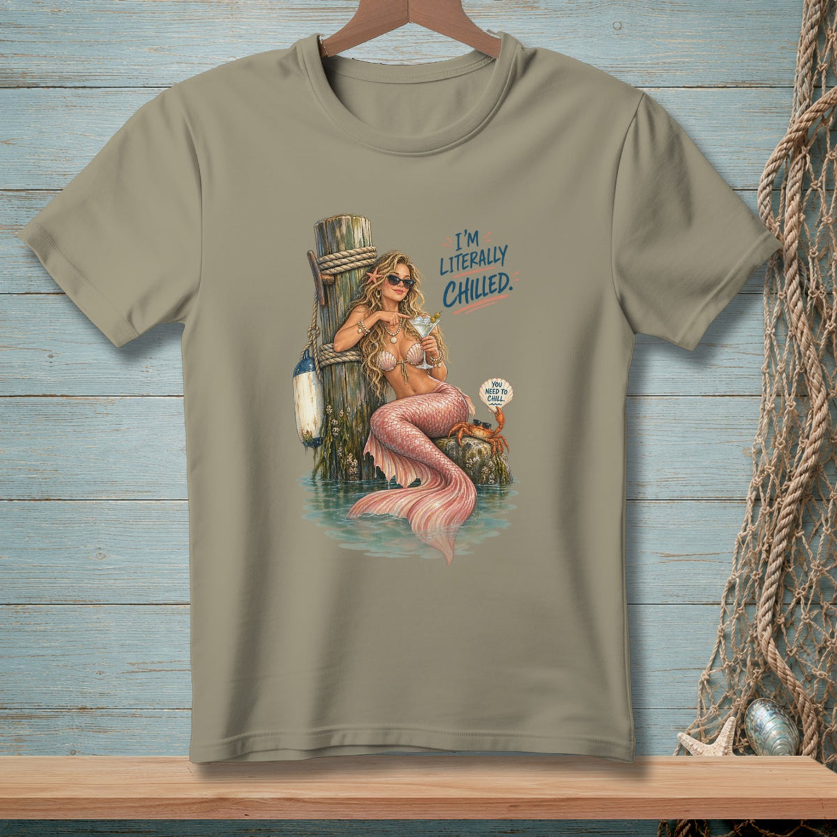 T-shirt graphic of a mermaid with text "I'M LITERALLY CHILLED" and a crab.