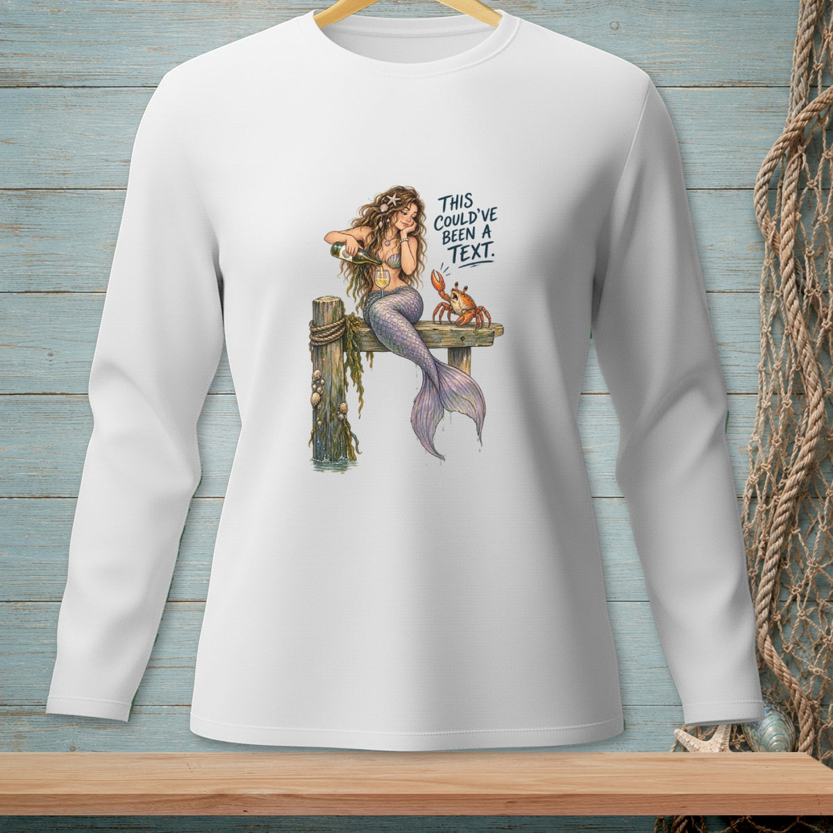 Mermaid pouring wine with a crab and text "THIS COULD'VE BEEN A TEXT."