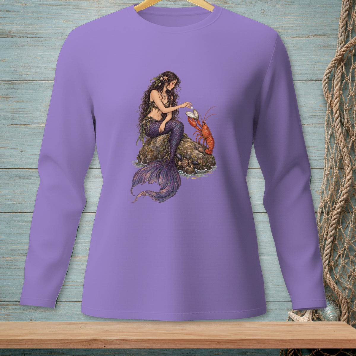 Long-sleeve lavender shirt with a mermaid and lobster illustration.