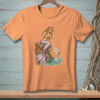 Mermaid sitting on rock with crabs, holding sign that says "Fix Your Expectations".