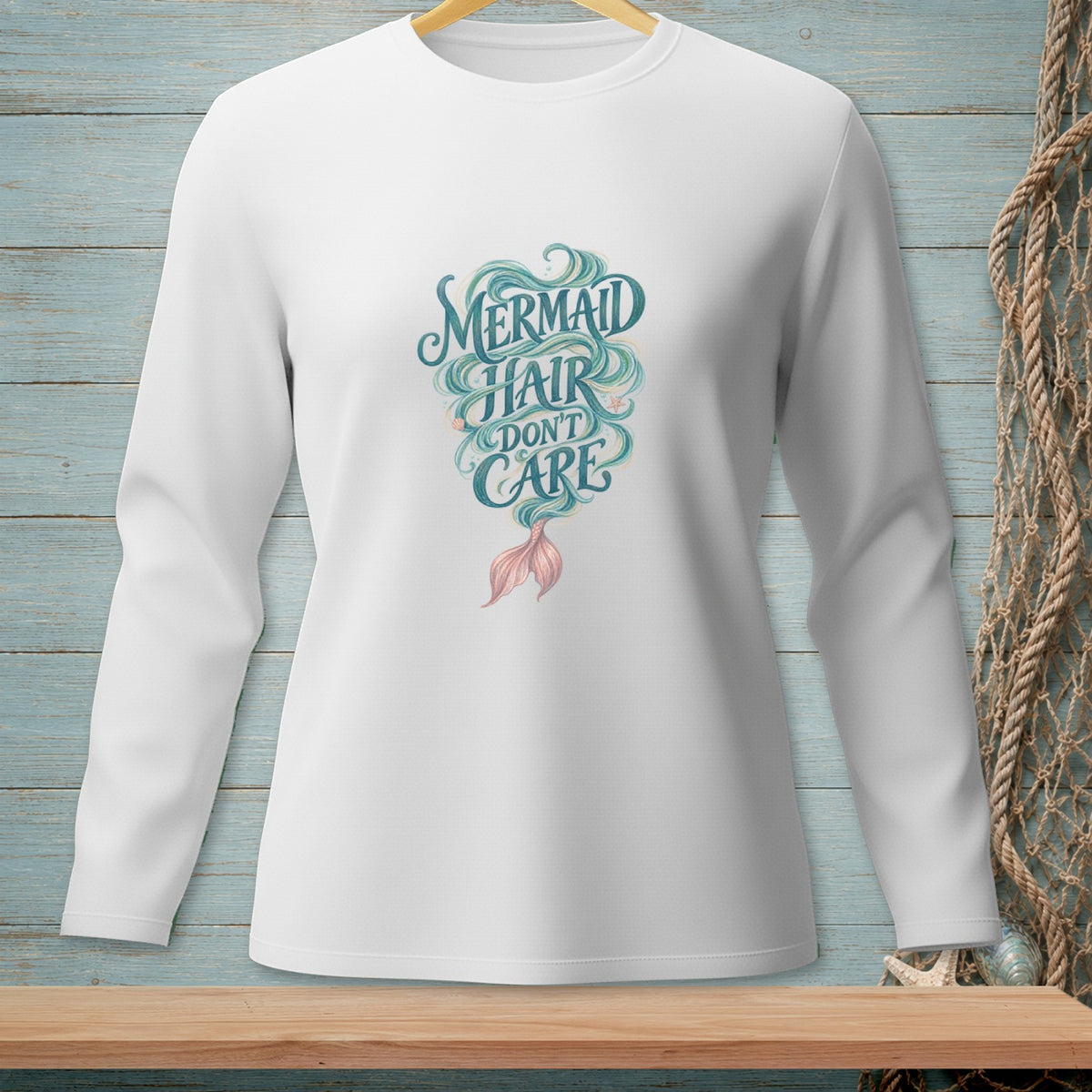 White long sleeve shirt with "Mermaid Hair Don't Care" text and mermaid tail.