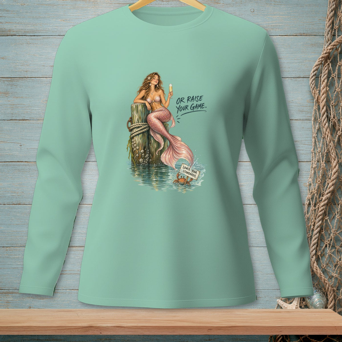 Mermaid on post with drink, text "Or Raise Your Game" and crab with sign.