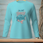 Teal long-sleeve shirt with "I'm Not Bossy I'm Buoyant" mermaid tail graphic.