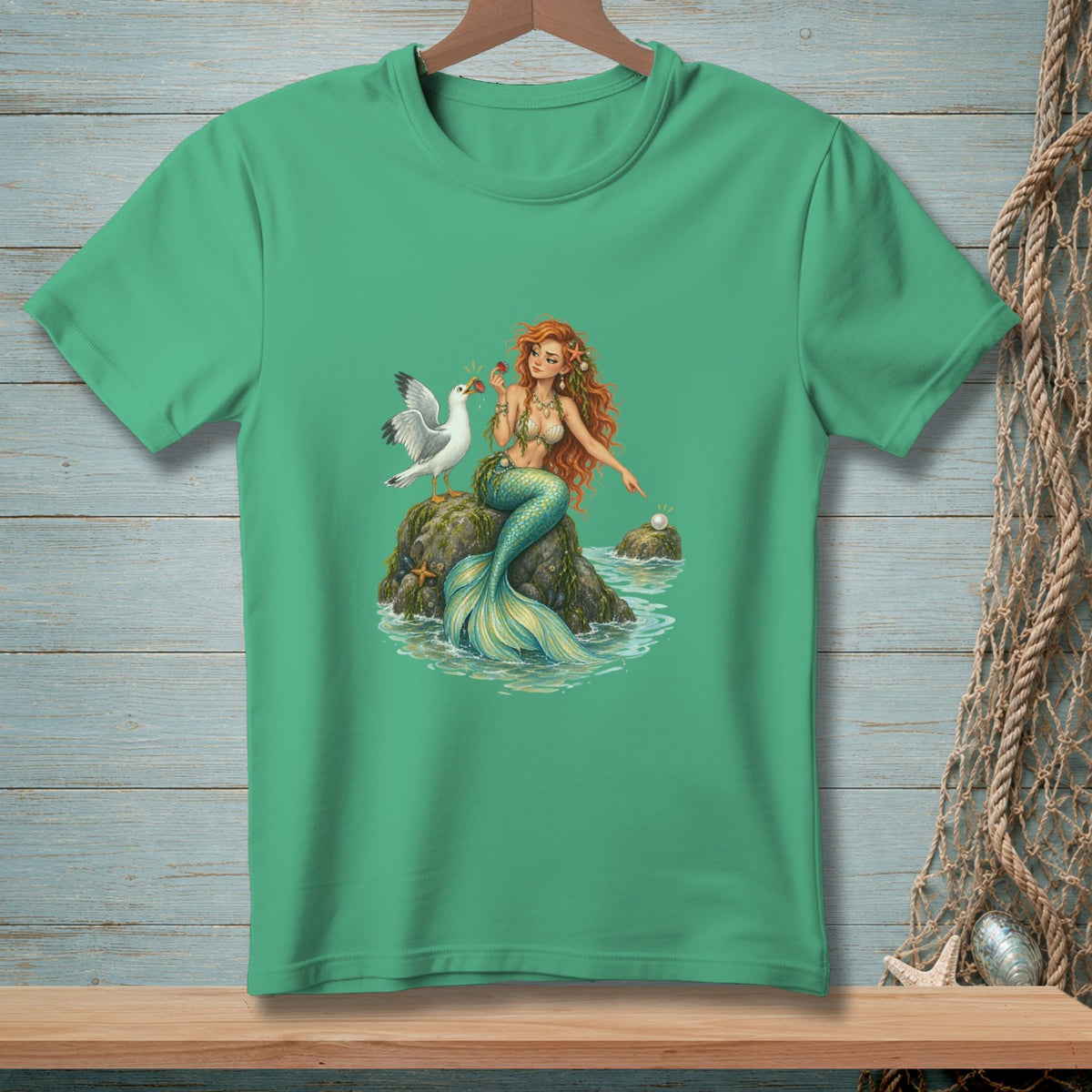 Mermaid with red hair sitting on a rock with a seagull and a pearl.