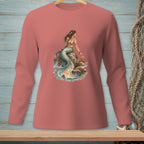 Mermaid sitting on rocks with a crab and a small sign on a coral long-sleeve shirt.