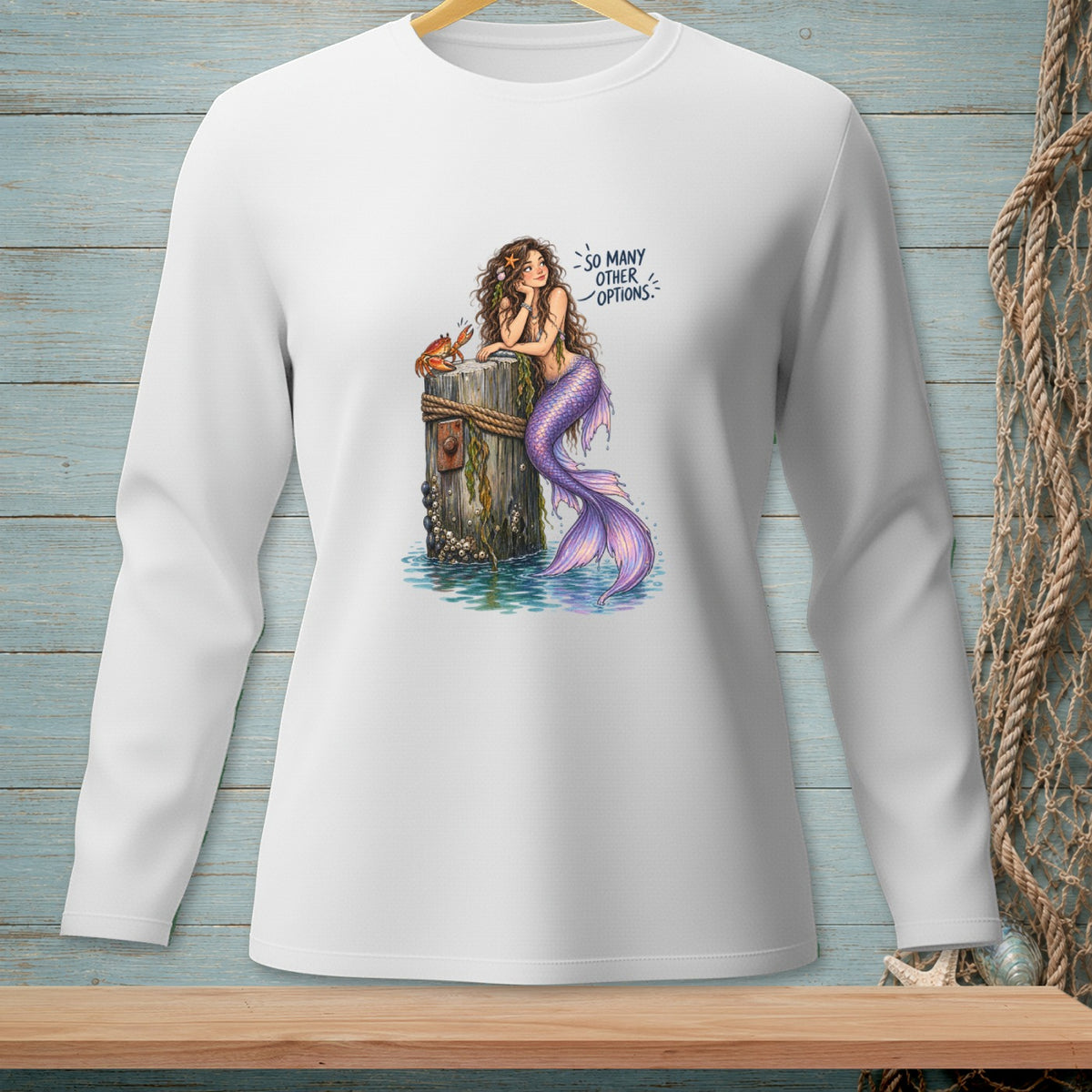 White long-sleeve shirt with a mermaid and crab graphic reading "So Many Other Options."