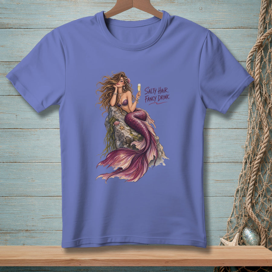 Purple t-shirt with a mermaid illustration and text "Salty Hair. Fancy Drink."