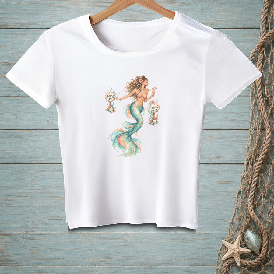White t-shirt with a watercolor mermaid graphic holding signs for "Drama" and "Drinks."