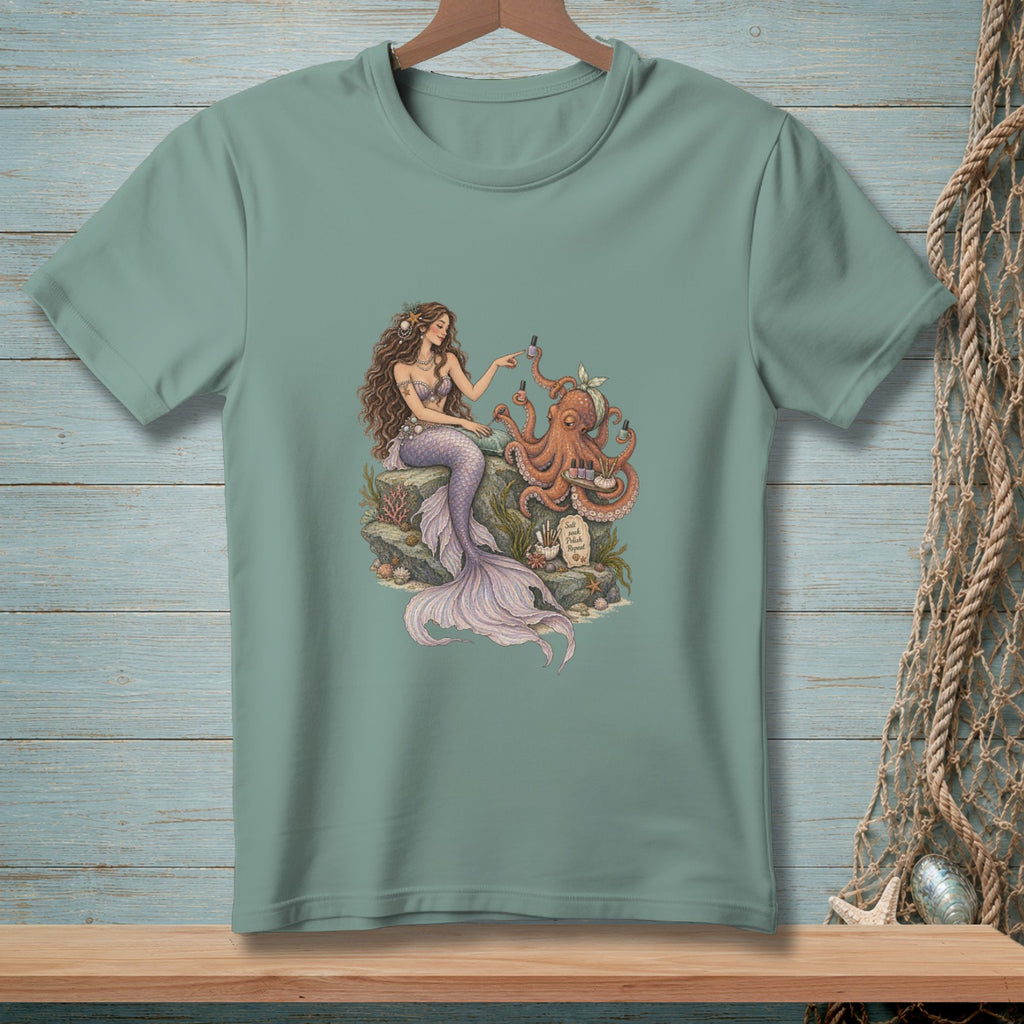 Mermaid gives octopus a manicure with polish and text "Salt Soak Polish Repeat".