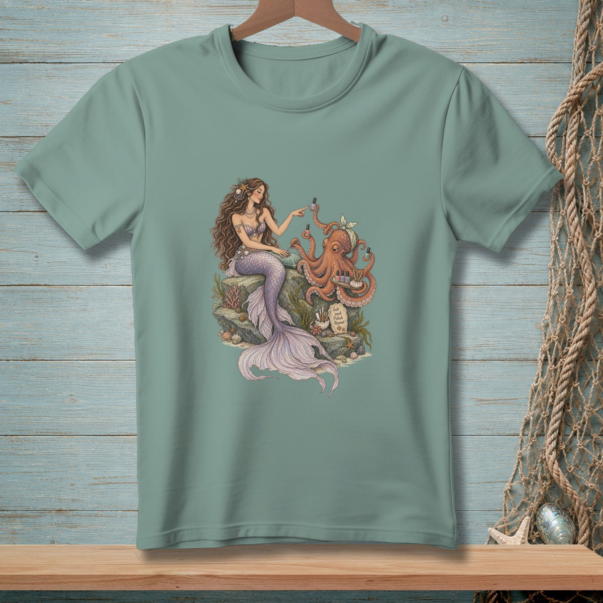 Mermaid gives octopus a manicure with polish and text "Salt Soak Polish Repeat".
