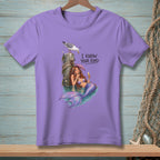 Purple t-shirt with a mermaid and seagull graphic and the text "I KNOW YOUR KIND."