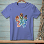 Three mermaids with colorful tails are relaxing in water, two with drinks.