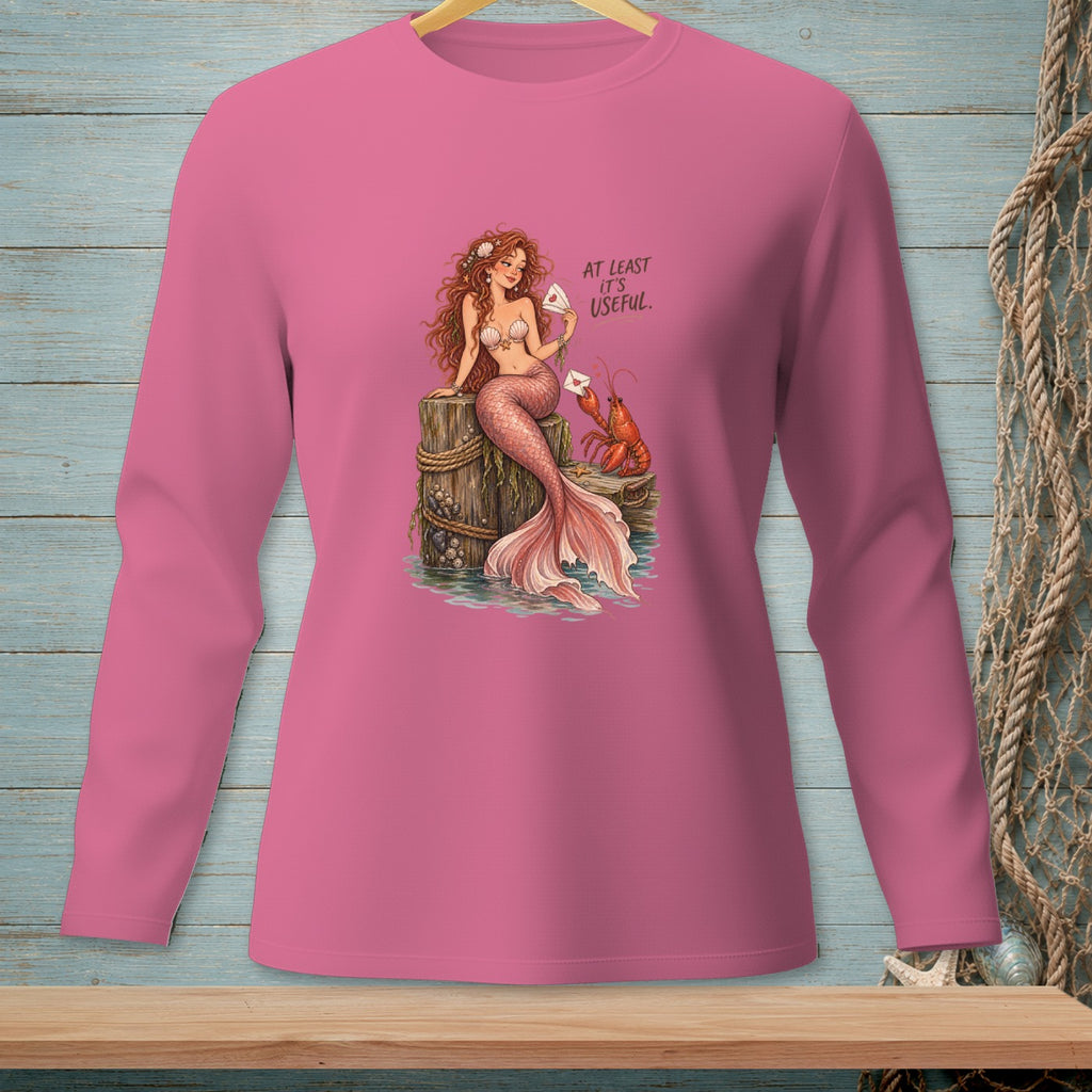 Mermaid and lobster illustration with text "AT LEAST IT'S USEFUL" on pink shirt.
