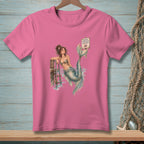 Pink t-shirt with a mermaid at a pier and "Proper Footwear Required" sign.