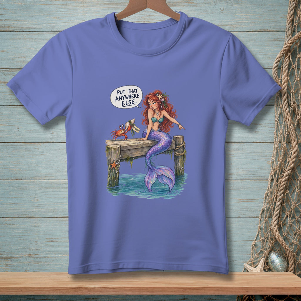 Mermaid and crab on a dock, with a speech bubble saying "Put that anywhere else."