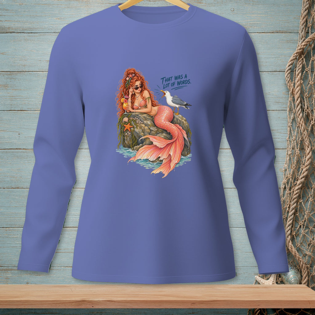 Illustration of a mermaid with a cocktail and a seagull saying "THAT WAS A LOT OF WORDS."