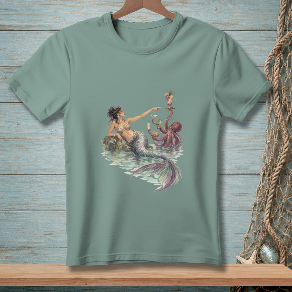 Mermaid and octopus sharing drinks on rocks in the water.