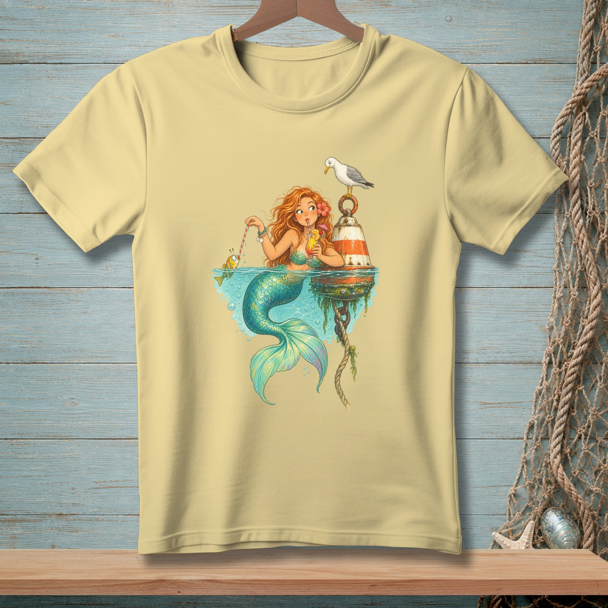 Illustration of a mermaid with red hair drinking from a glass, with a fish and seagull.