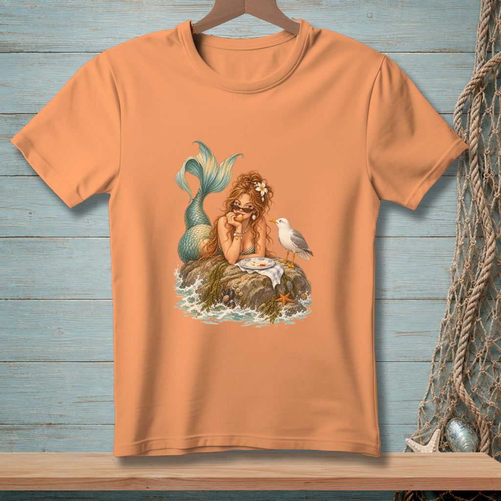 Mermaid with sunglasses on a rock eating with a seagull.